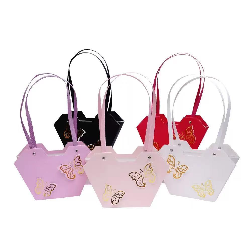 Bolsa impermeable para flores con mariposas doradas