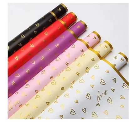 Papel para envolver flores con corazones de borde dorado