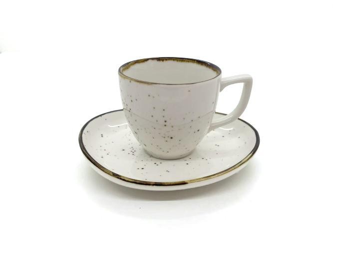 Taza de porcelana con diseño moteado con plato de 200 ml