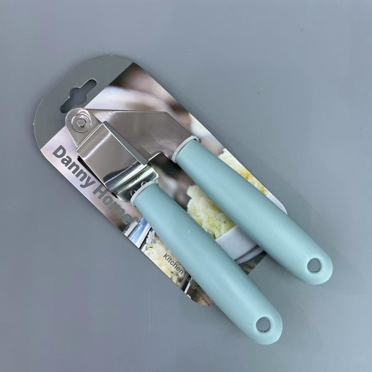 Prensa de ajo de acero inoxidable y PP de 18 cm