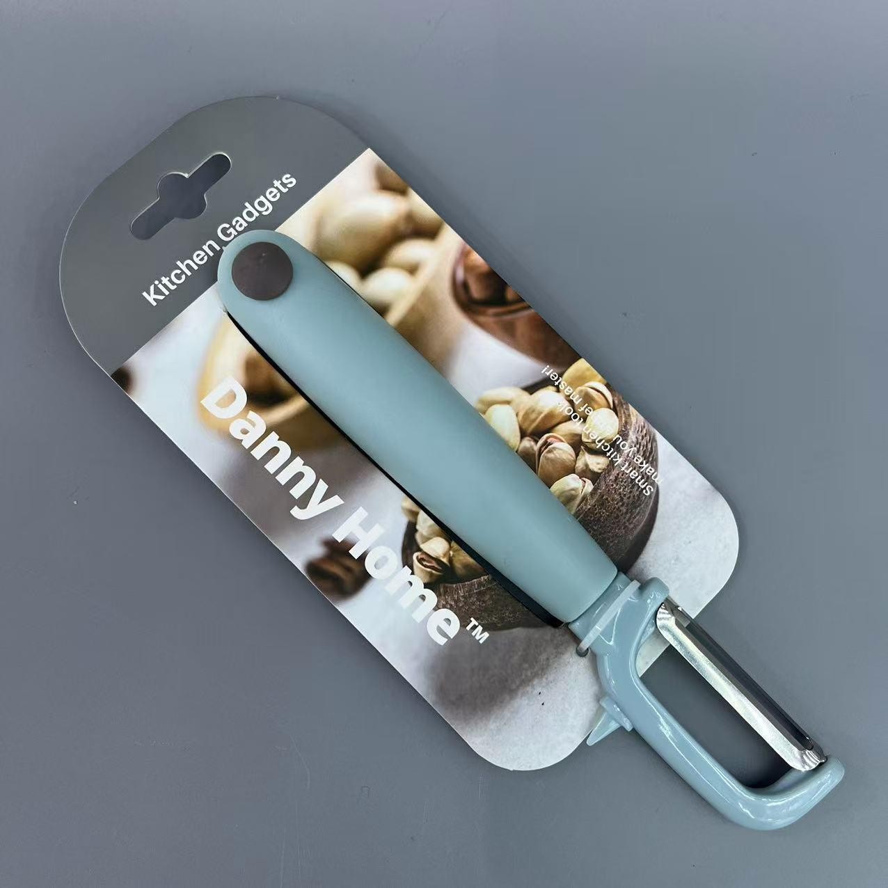 Pelador en Y de acero inoxidable y PP de 18,5 cm