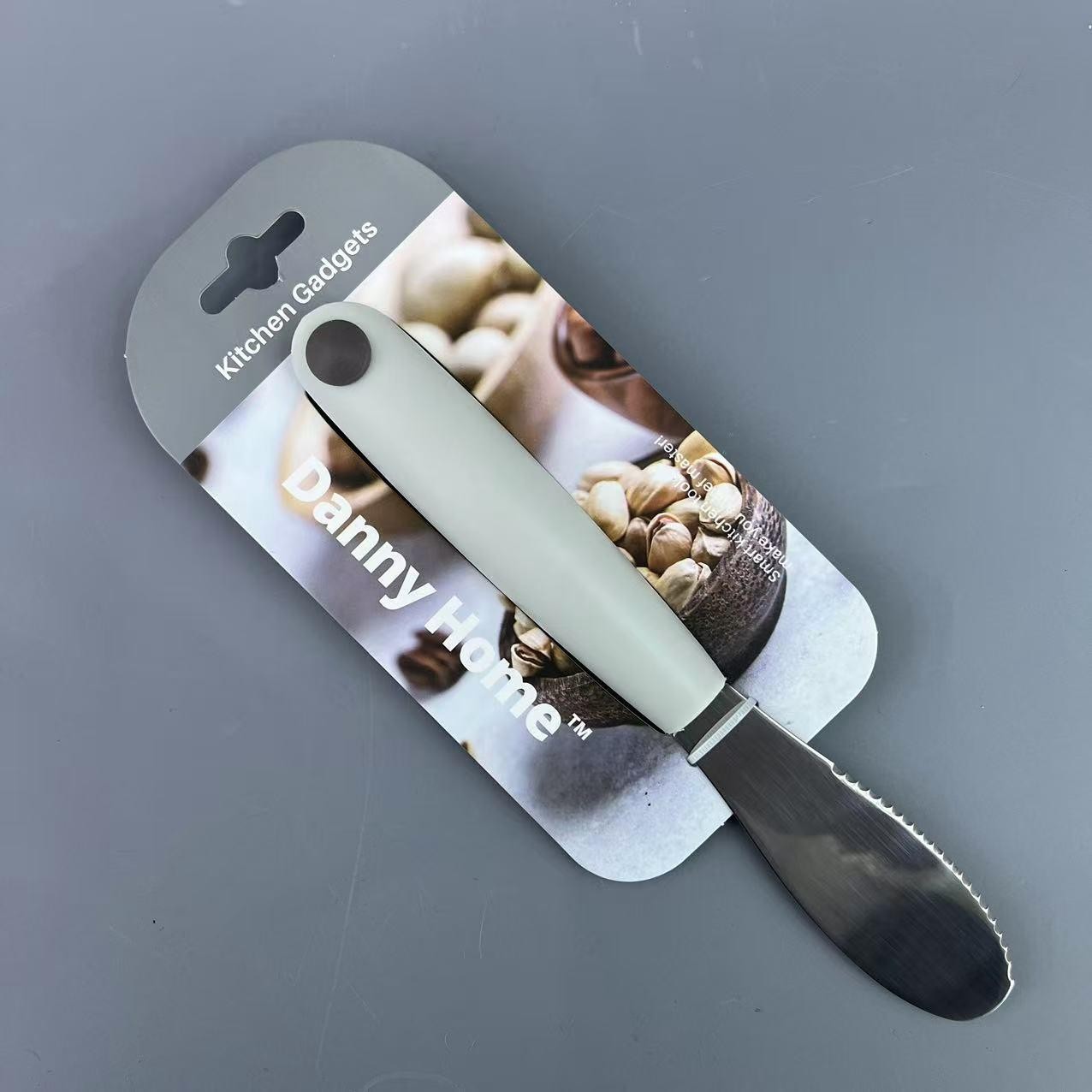 Cuchillo para mantequilla dentado de acero inoxidable y PP de 21 cm