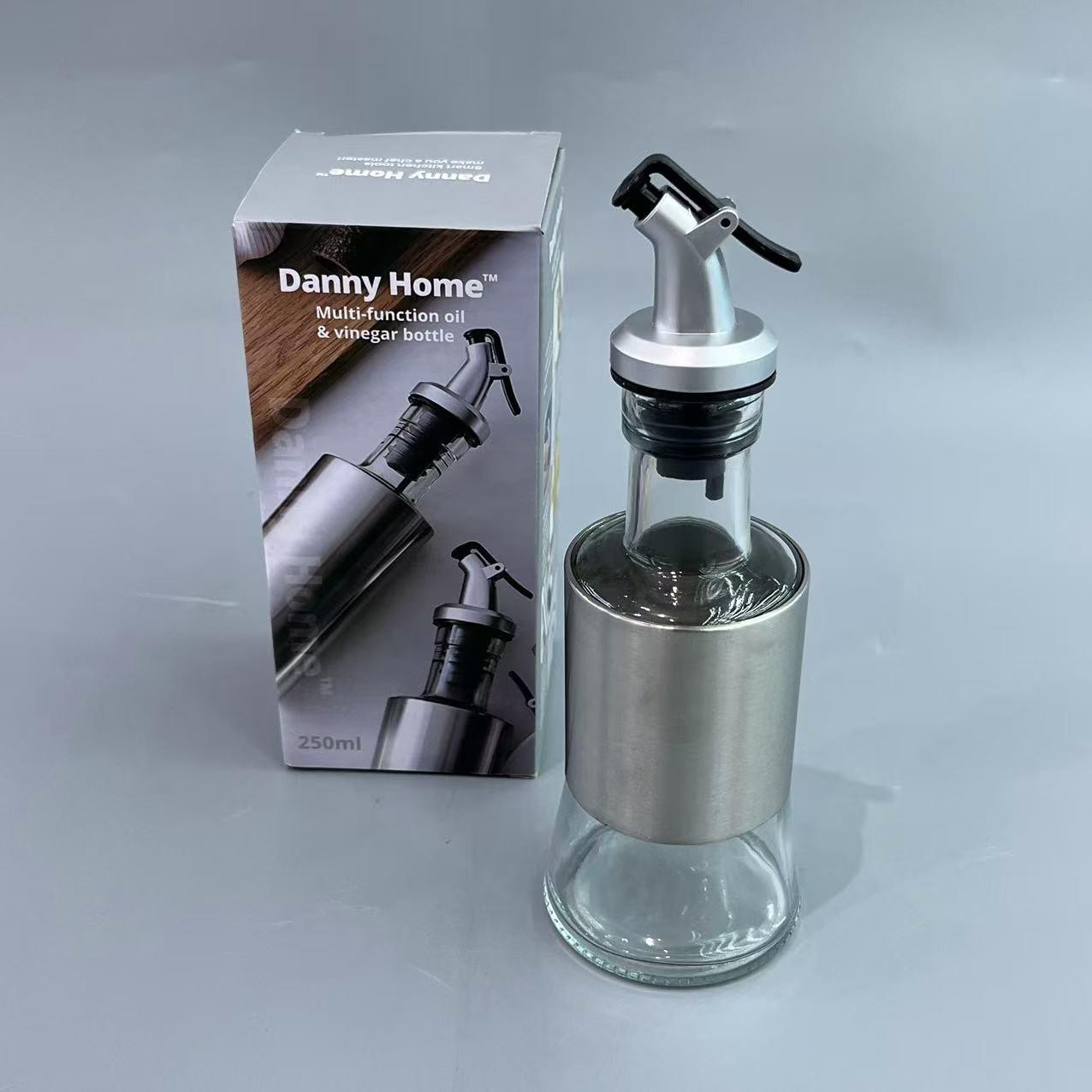 Aceitera de vidrio y acero inoxidable de 250 ml