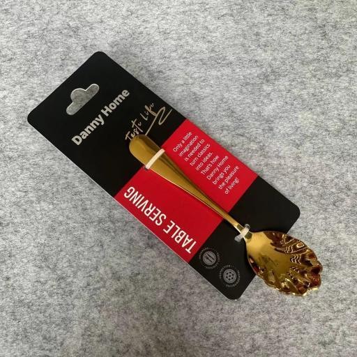 Cuchara para azúcar de acero inoxidable con acabado dorado